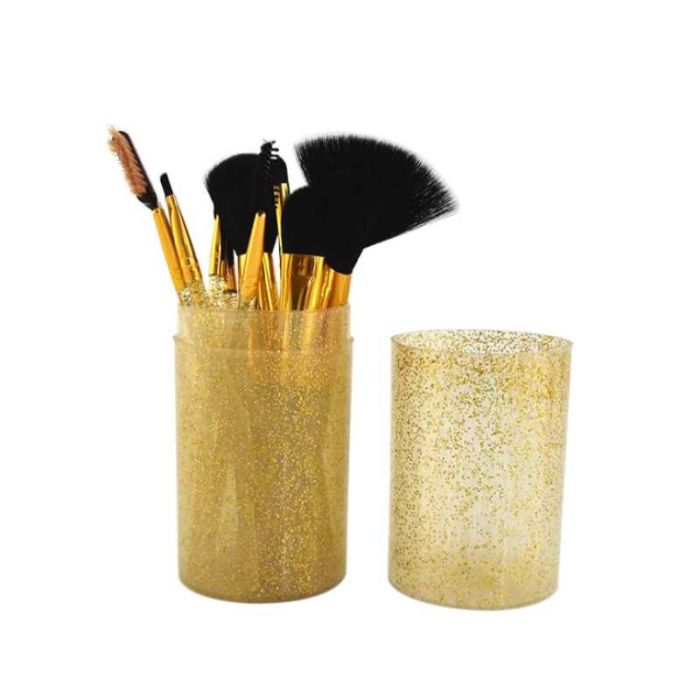 A set of makeup brushes in a Crystal gold tube 12pcs