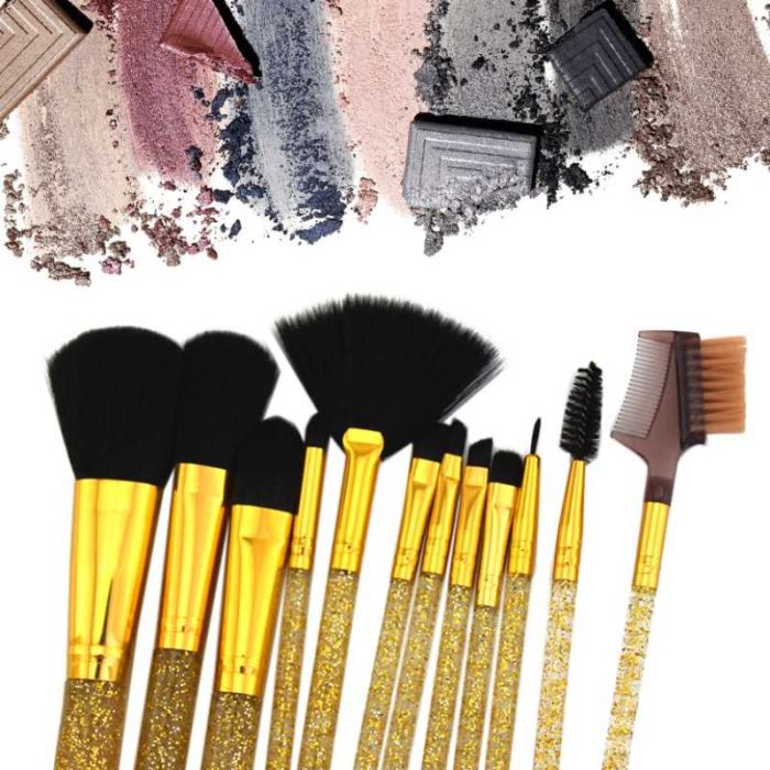 A set of makeup brushes in a Crystal gold tube 12pcs