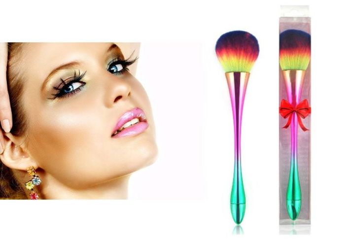 A makeup brush for powder and blush in a gift box with a rainbow bow